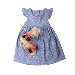 blue and white polka dot dress with colorful floral sandals for product photography example